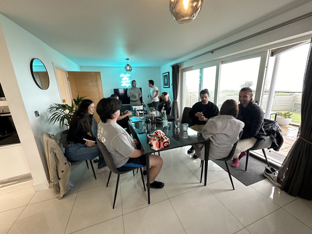 Macrocosmos team hanging out in the kitchen